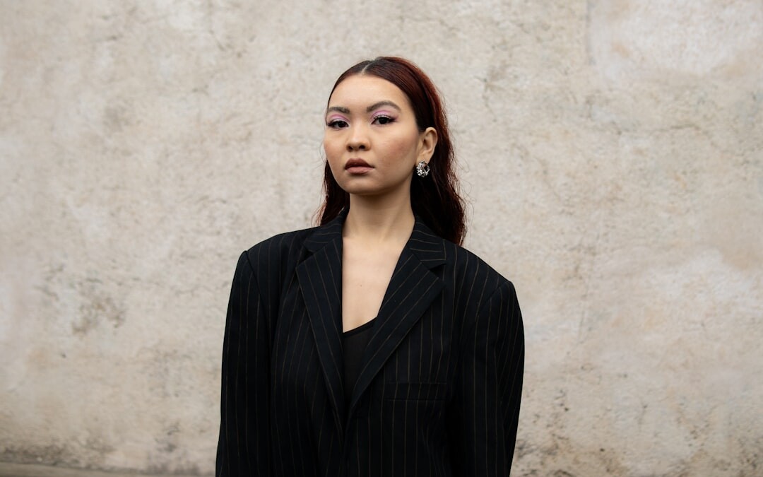Confident businesswoman in formal attire looking at camera